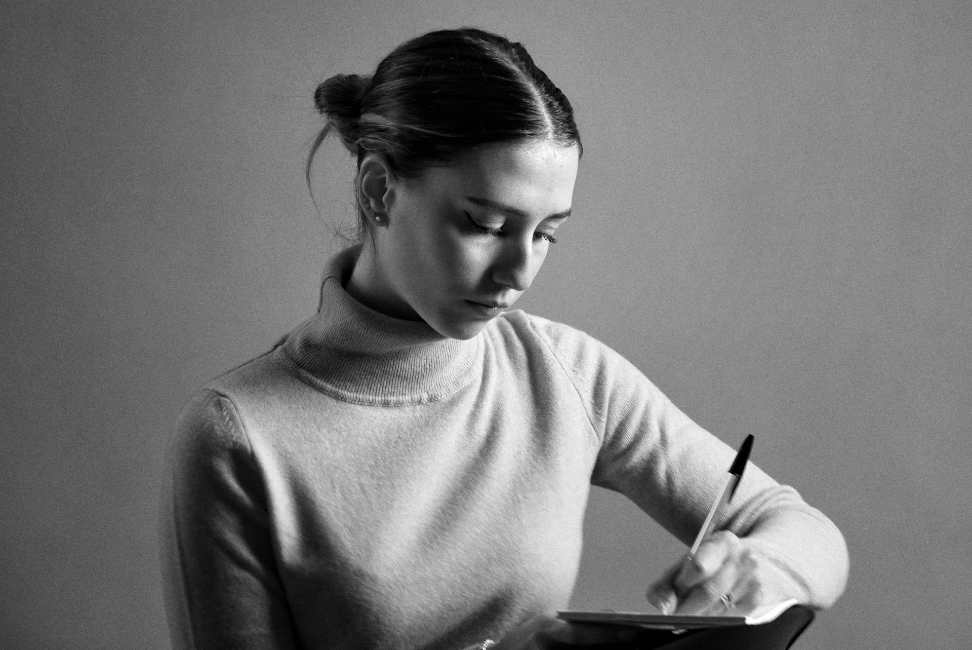 Portrait of Marlow Vane at her writing desk